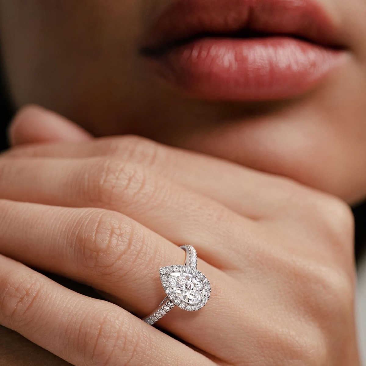 Pear Halo solitaire ring