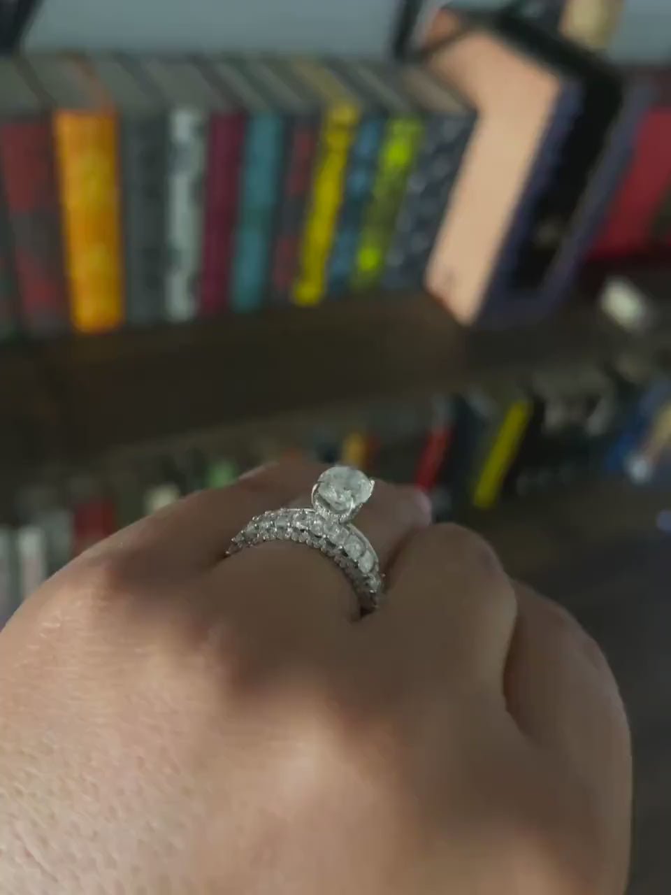 Filmed in front of the bookshelves