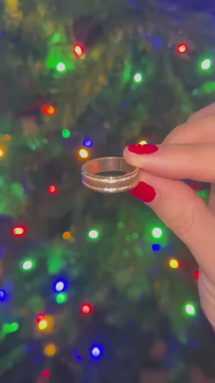 Held up in front of the tree