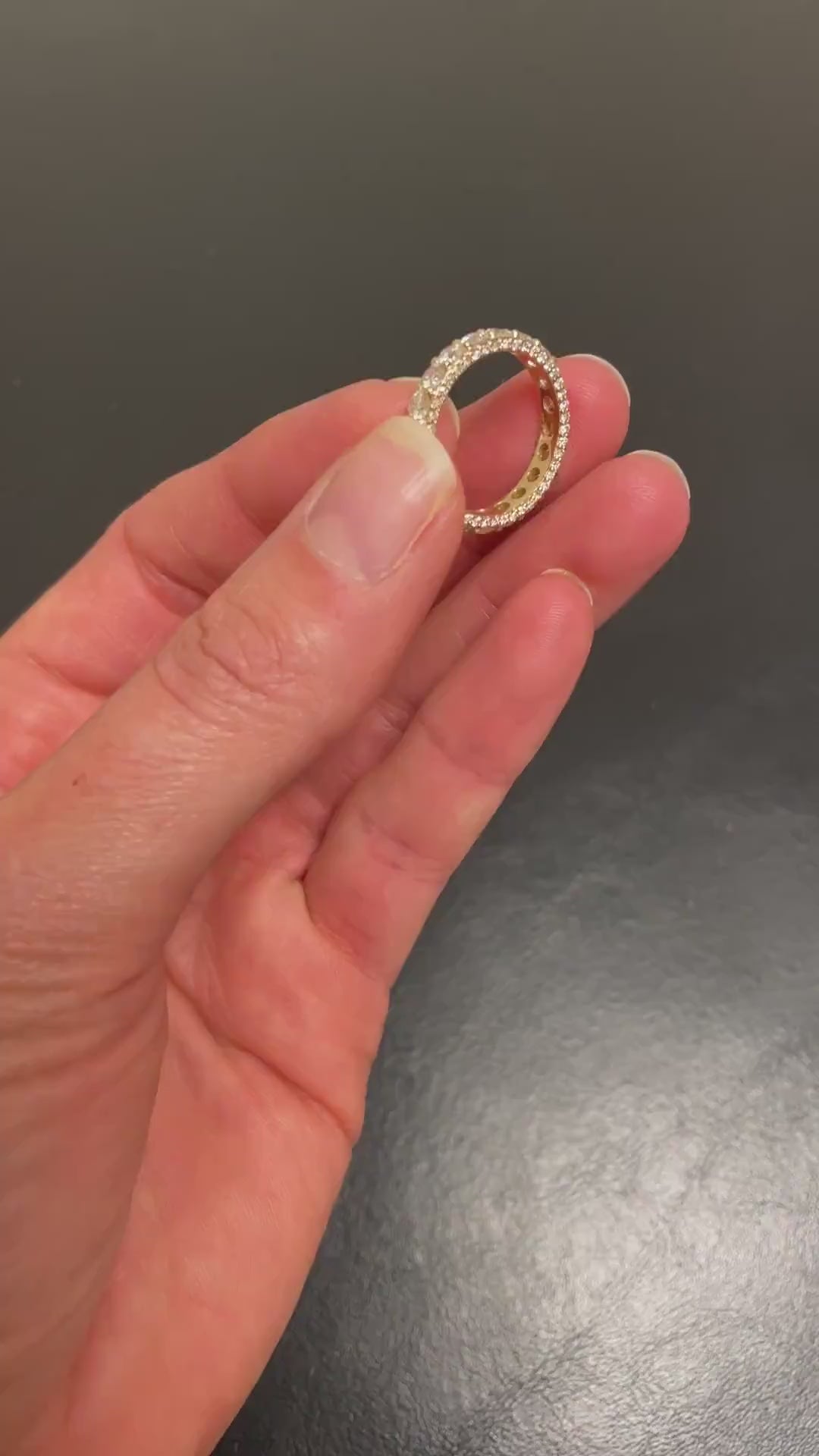 Turned over in the fingers